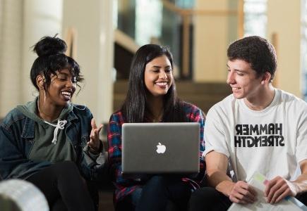 Three students talking